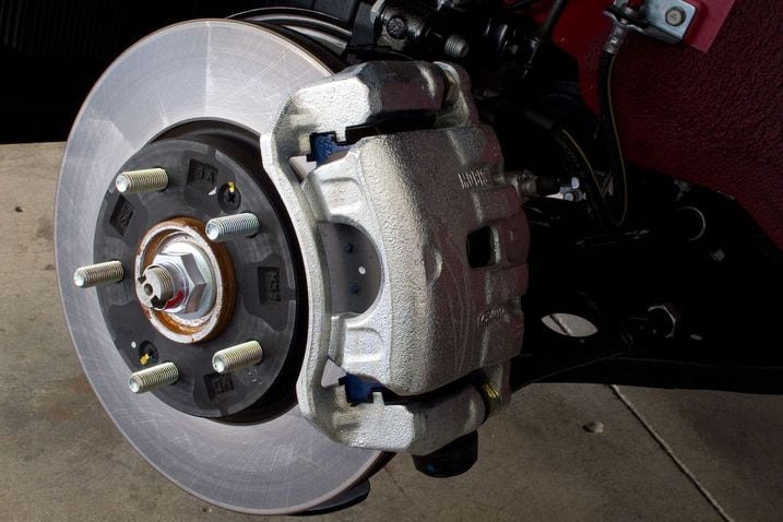 2012_veloster_f34_hyundai_sus_fr_det_ brk.jpg