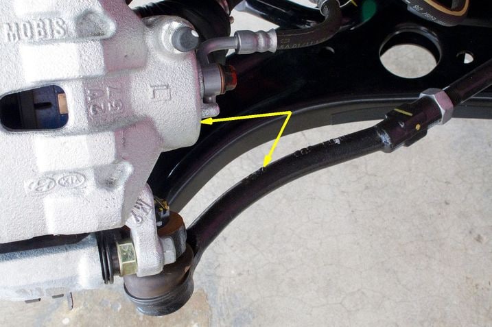 2012_veloster_f34_hyundai_sus_fr_det_ steerbrake_2.jpg